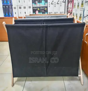 Foldable Laundry Hamper With a Black Fabric Bag