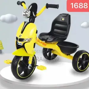 A Three-Wheeled Tricycle Yellow and Black