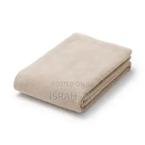 Folded Muji Twin Pile Bath Towel.