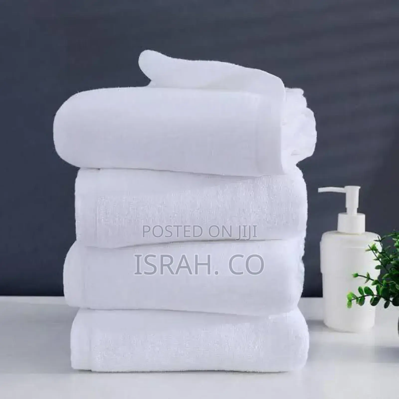 Stack of Four White Cotton Bath Towel