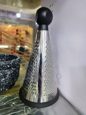 Three-Sided Stainless Steel Cheese Grater.