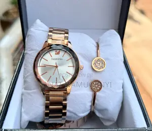 Swarovski Rose Golden Watch With White Display
