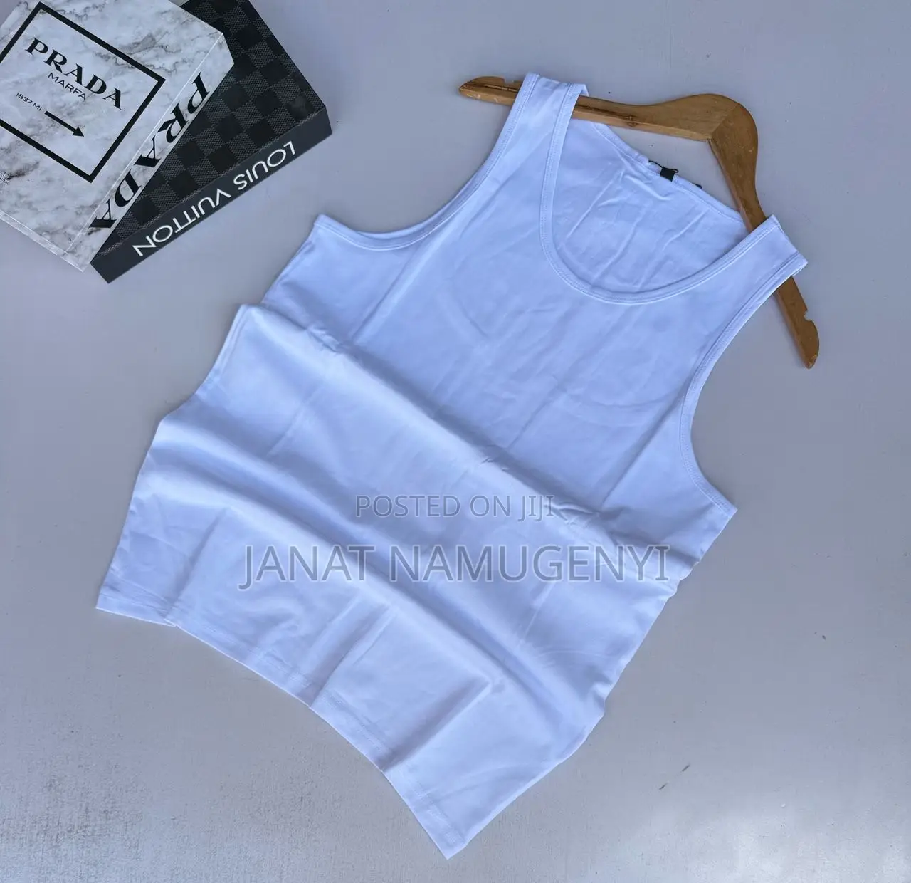 Plain White Vests Available