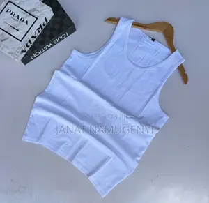Plain White Vests Available