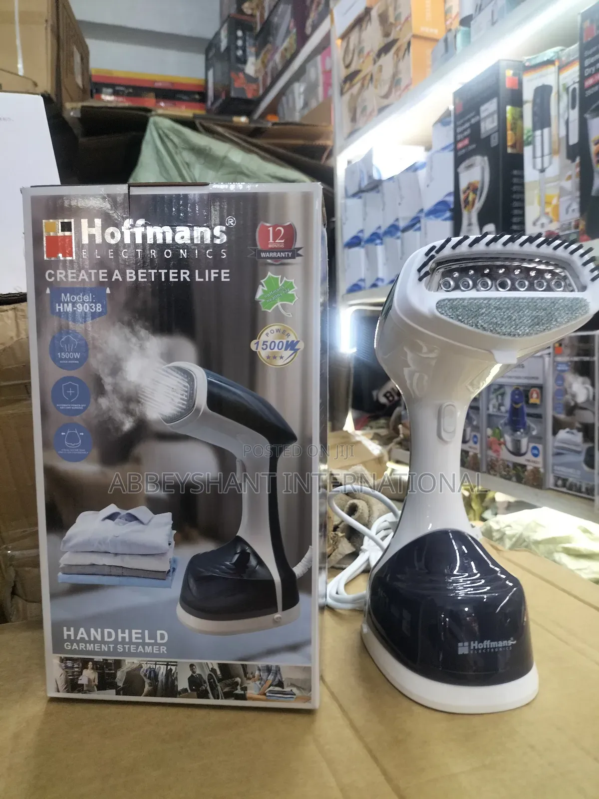Hoffmans Handheld Garment Steamer, Model Hm-9038.
