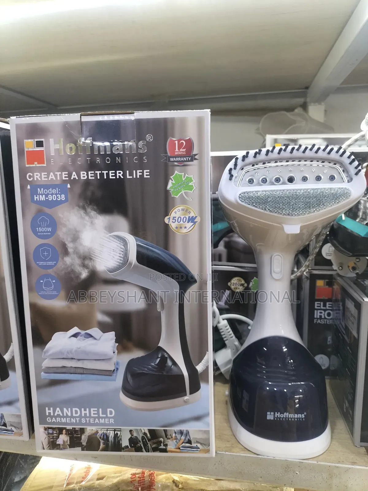 Hoffmans Handheld Garment Steamer, Model Hm-9038.