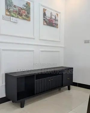 The White Tv Stand: A/ Mystical Creature/ That Has Been /
