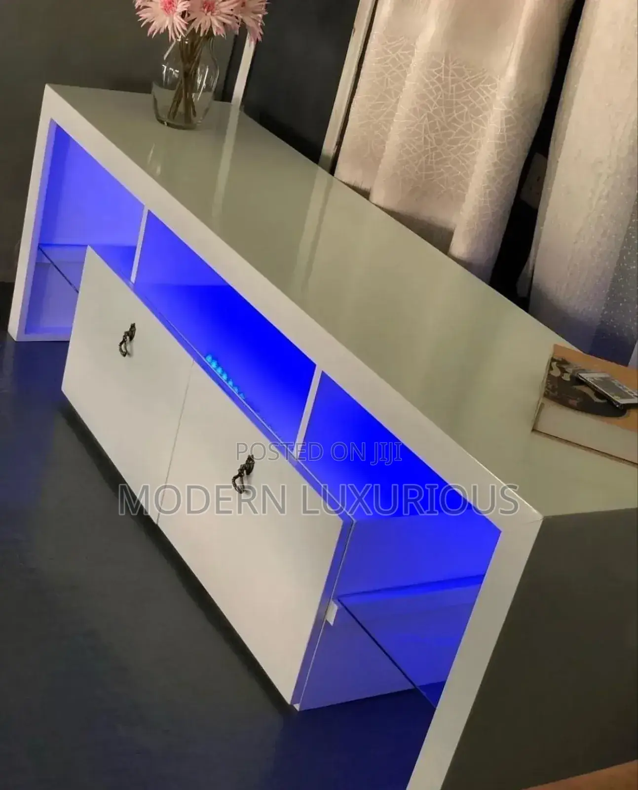 A White Skyscraper Will/ Balance on Its/ Tip to Display My /