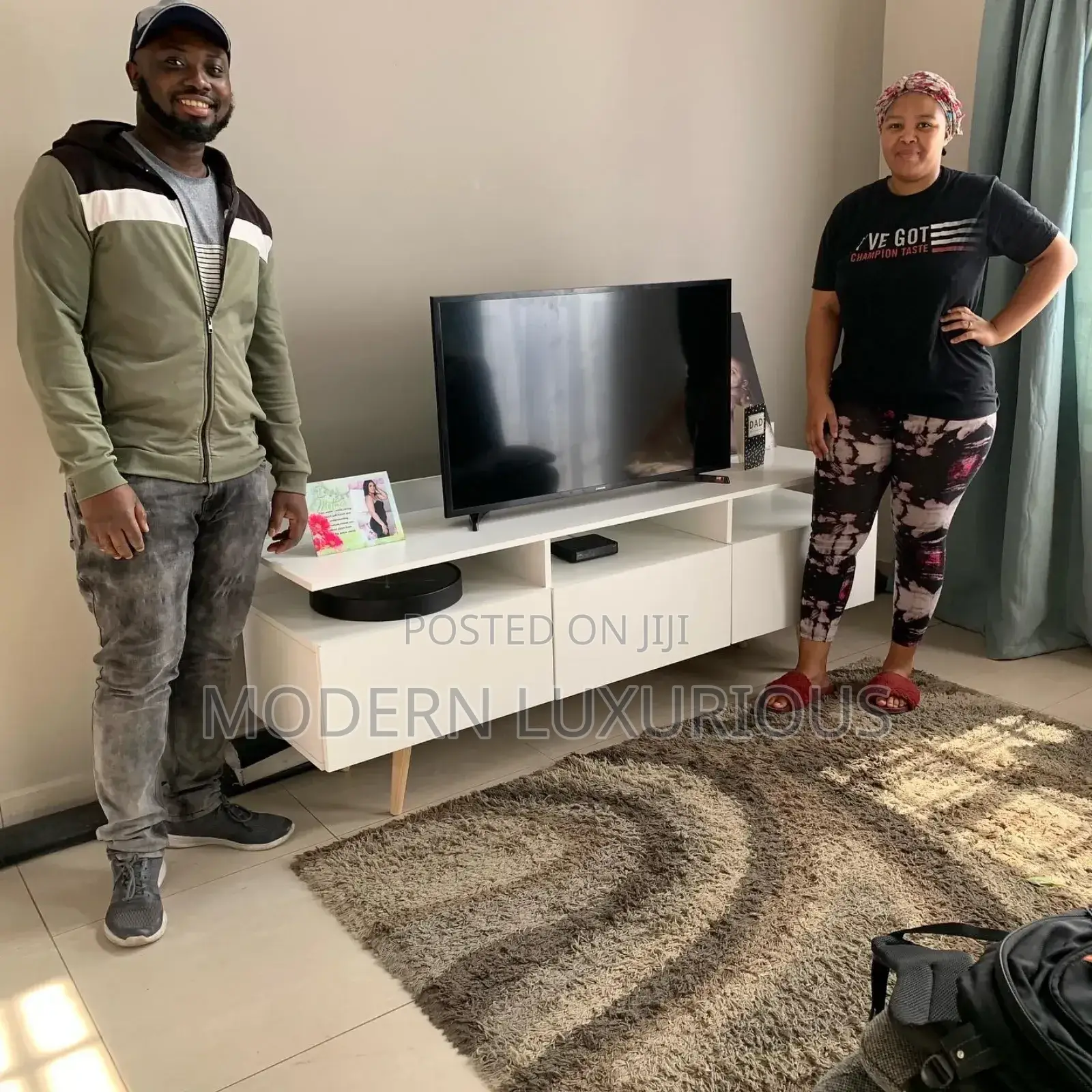 /Experience the/ Difference With Our Premium Black Tv Stand