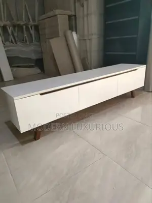 This Tv Stand Is 9 Feet Long or 2.7 Metres.
Has a Fireplace