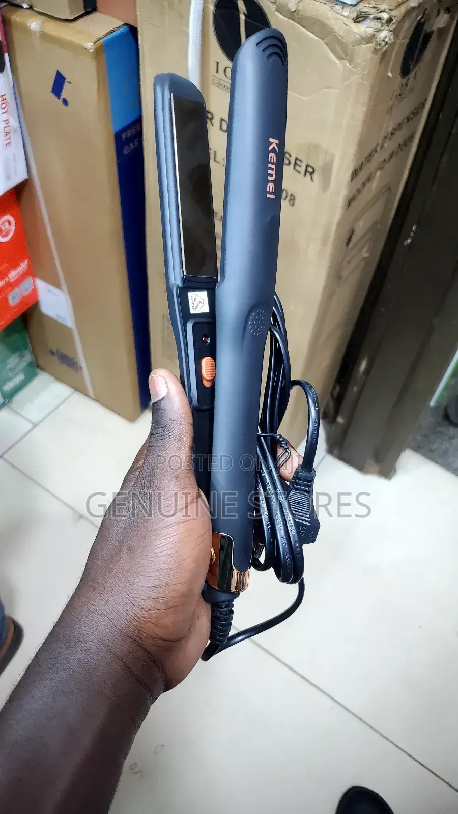 Hair Straightener Which Is Hand Held.