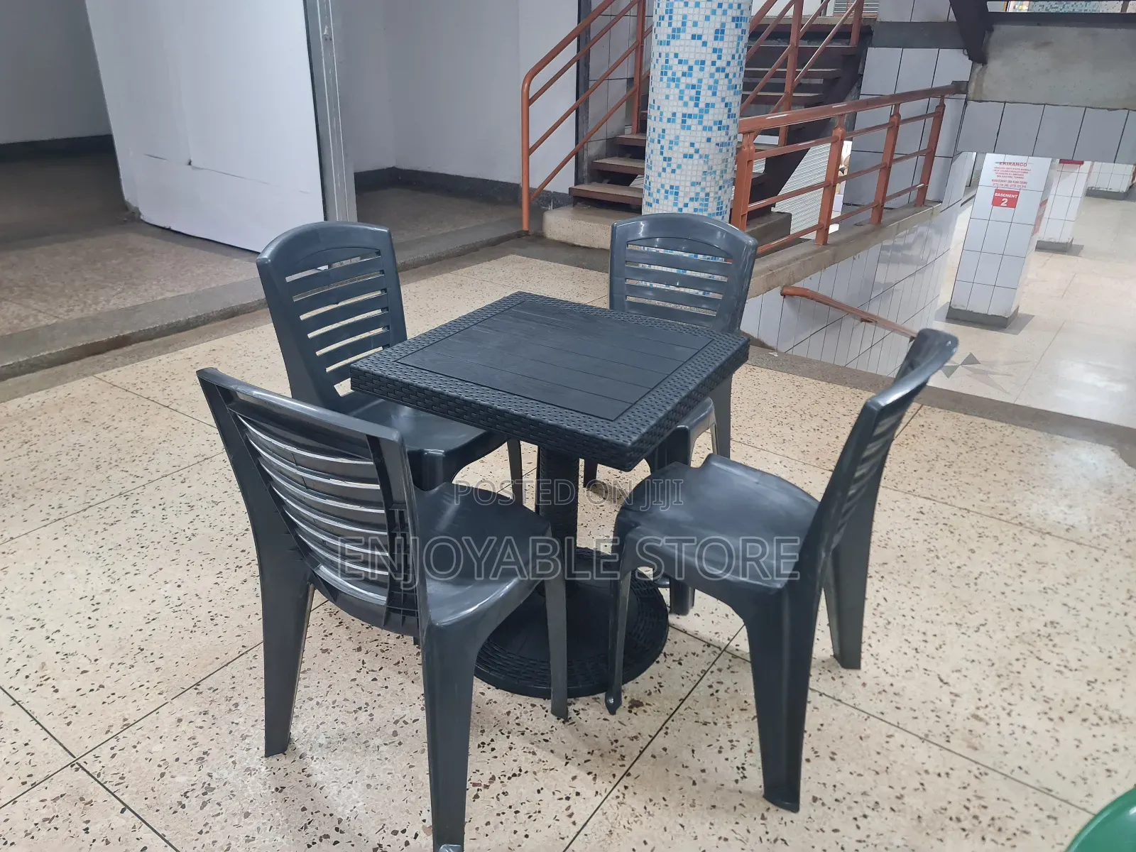 Easy Outdoor Plastic Chairs and a Table Set