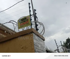 Electric Fence With Roofing Razor Wire
