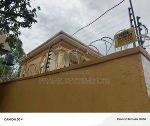 Electric Fence With Roofing Razor Wire