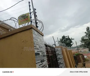 Electric Fence With Roofing Razor Wire