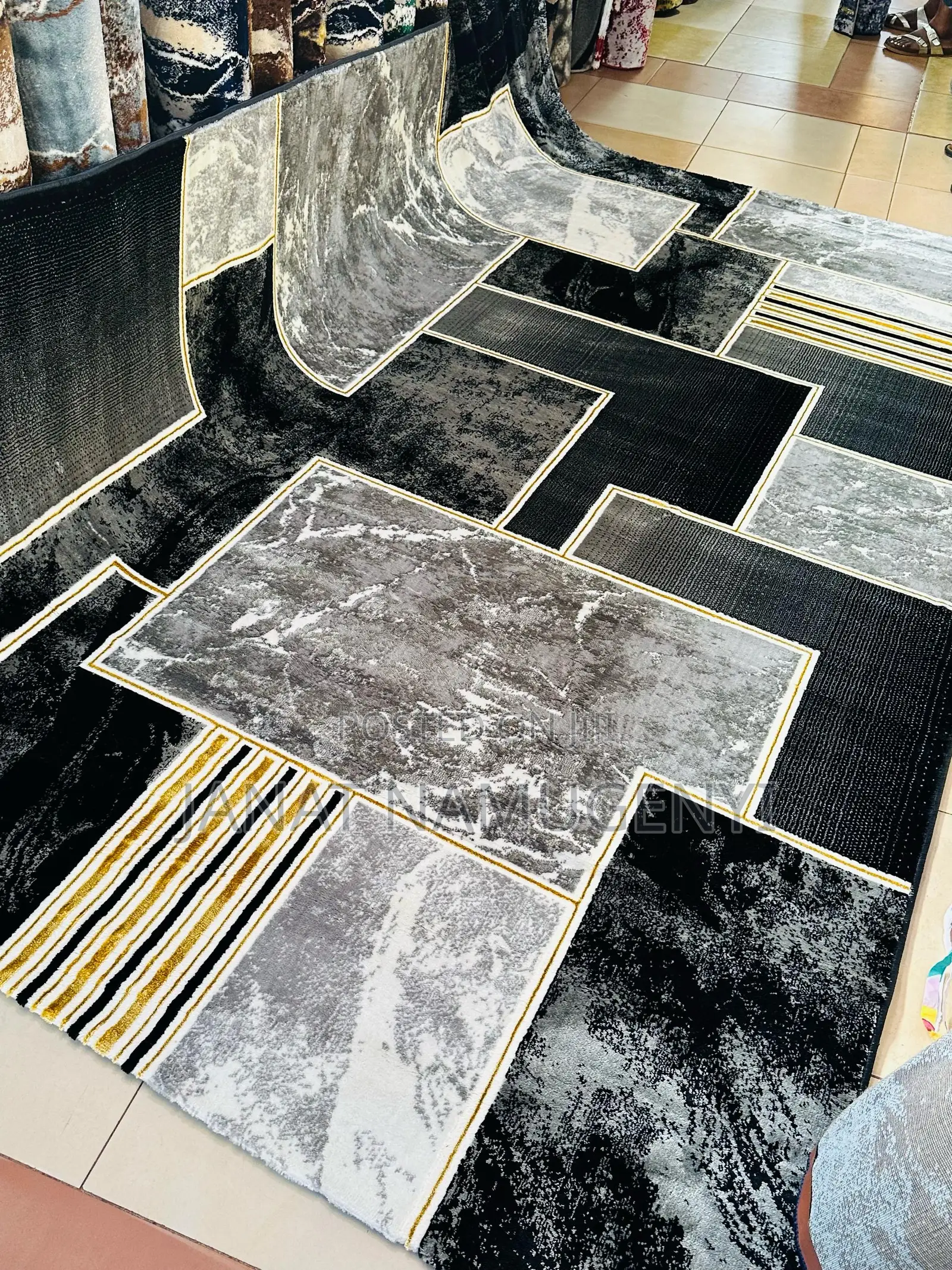 Large Sized Black and Grey Designed Carpet
