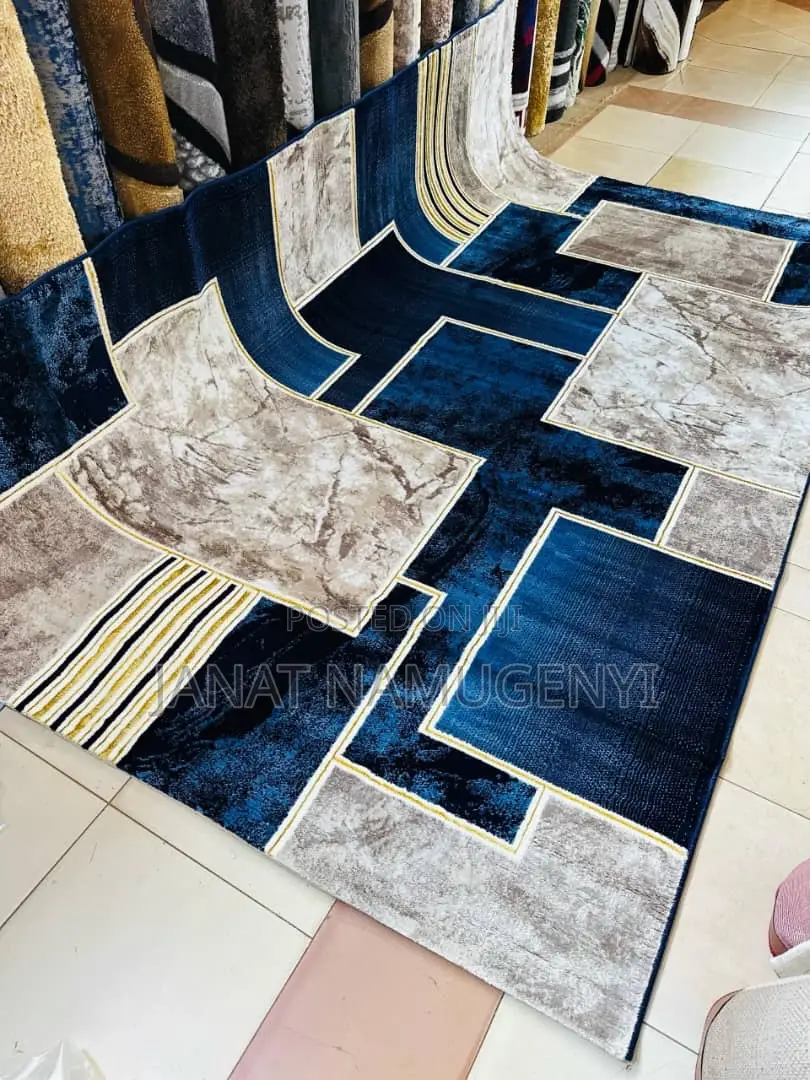 Large Sized Blue and Cream Designed Carpet