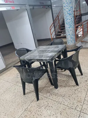 Restaurant Table and Plastic Chairs