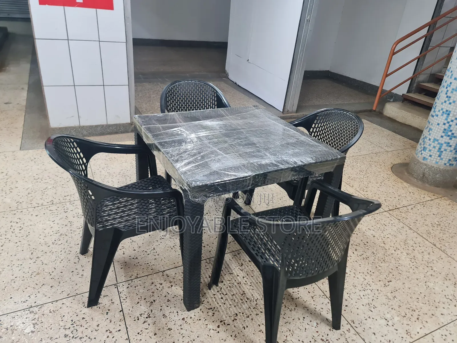 Restaurant Table and Plastic Chairs