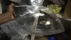 Headlamp Glass Corolla 210