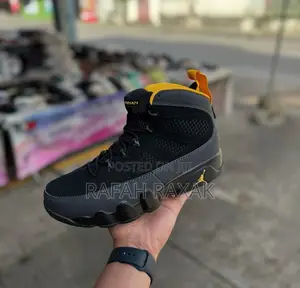 Original Air Jordan 9 Retro “University Gold” Sneakers