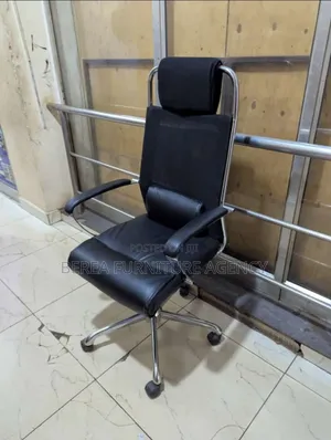 Fabric and Leather Swiveling Chair With Headrest Support
