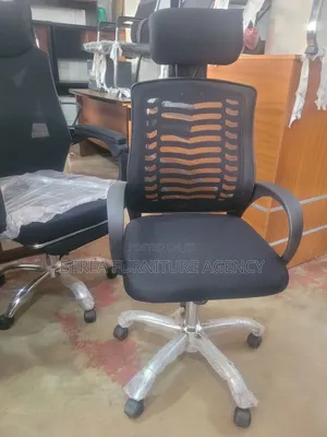 Brand New Mesh Swiveling Office Chair With Headrest