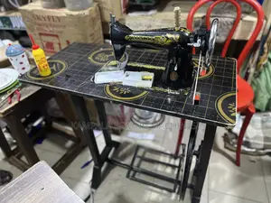 New Sewing Machines in the Box With Warranty Card