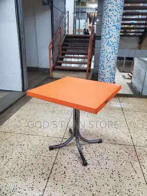 Orange Plastic Table With Metallic Legs