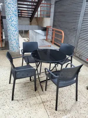 Dining Glass Table and Plastic Chairs