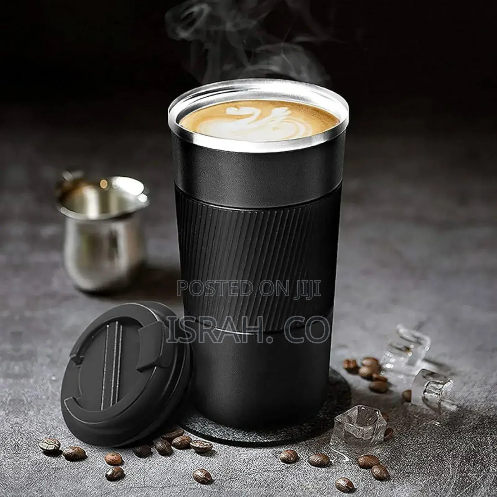 A Travel Coffee Mug.