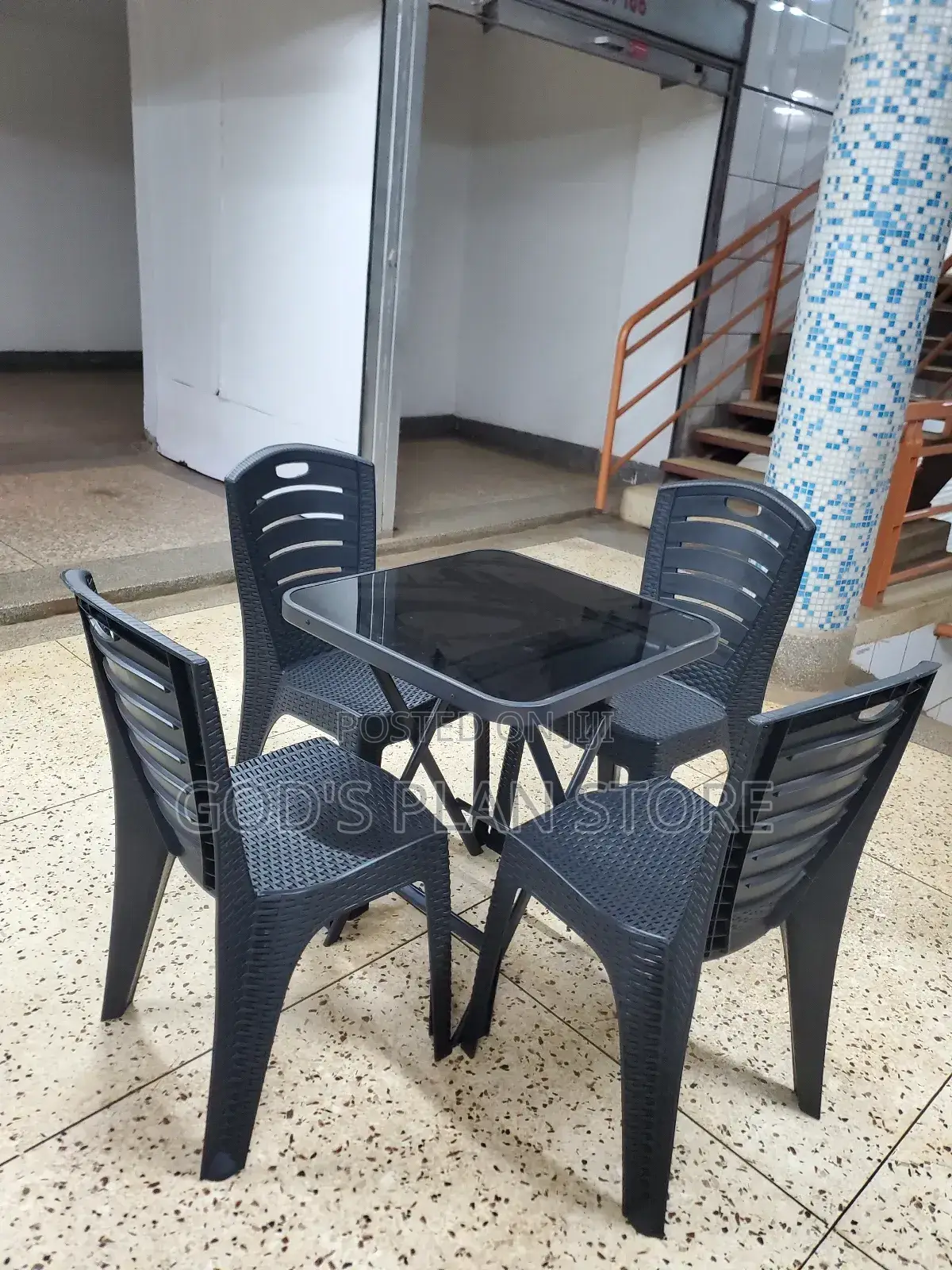 Plastic Chairs and Square Glass Table Set for Unique Dining