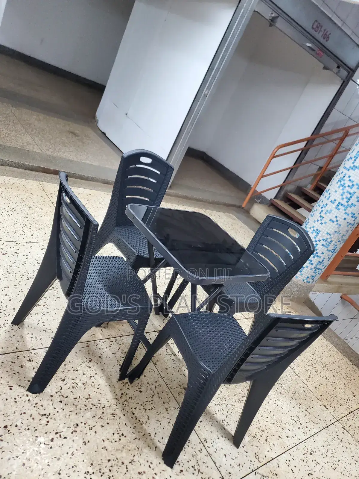 Plastic Chairs and Square Glass Table Set for Unique Dining