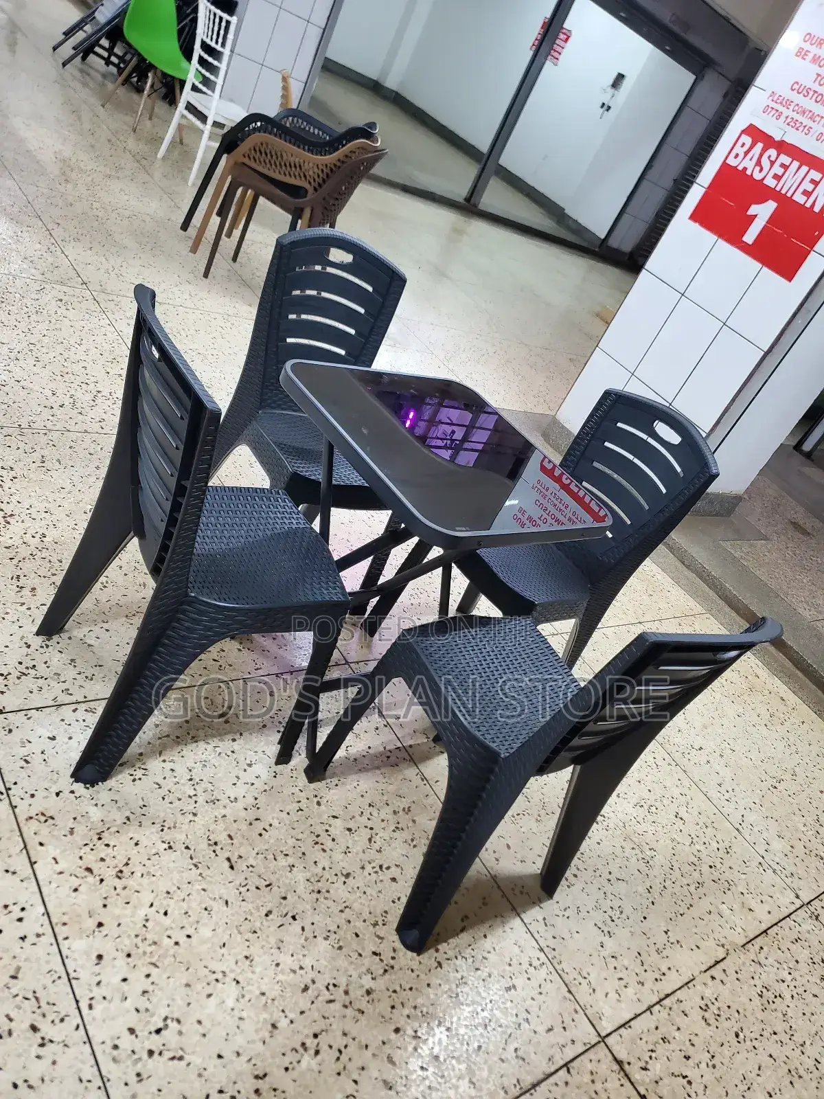 Plastic Chairs and Square Glass Table Set for Unique Dining