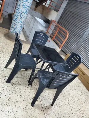 Plastic Chairs and Square Glass Table Set for Unique Dining