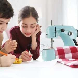 Mini Sewing Machine, Model 303