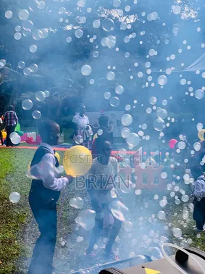 Bubble And Fog Machine With Bubble Liquid On Hire