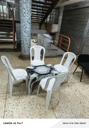 Plastic Chairs and Medium Table