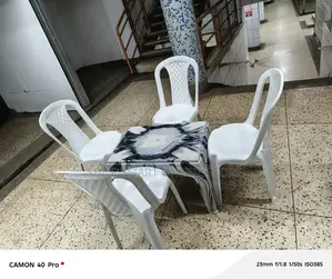 Plastic Chairs and Medium Table