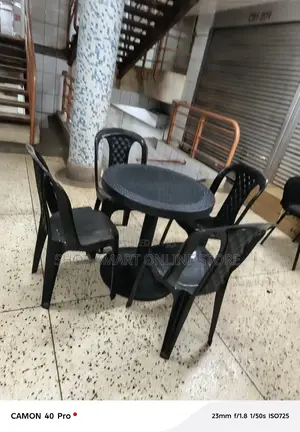 A Set of Plastic Tabe and Chairs