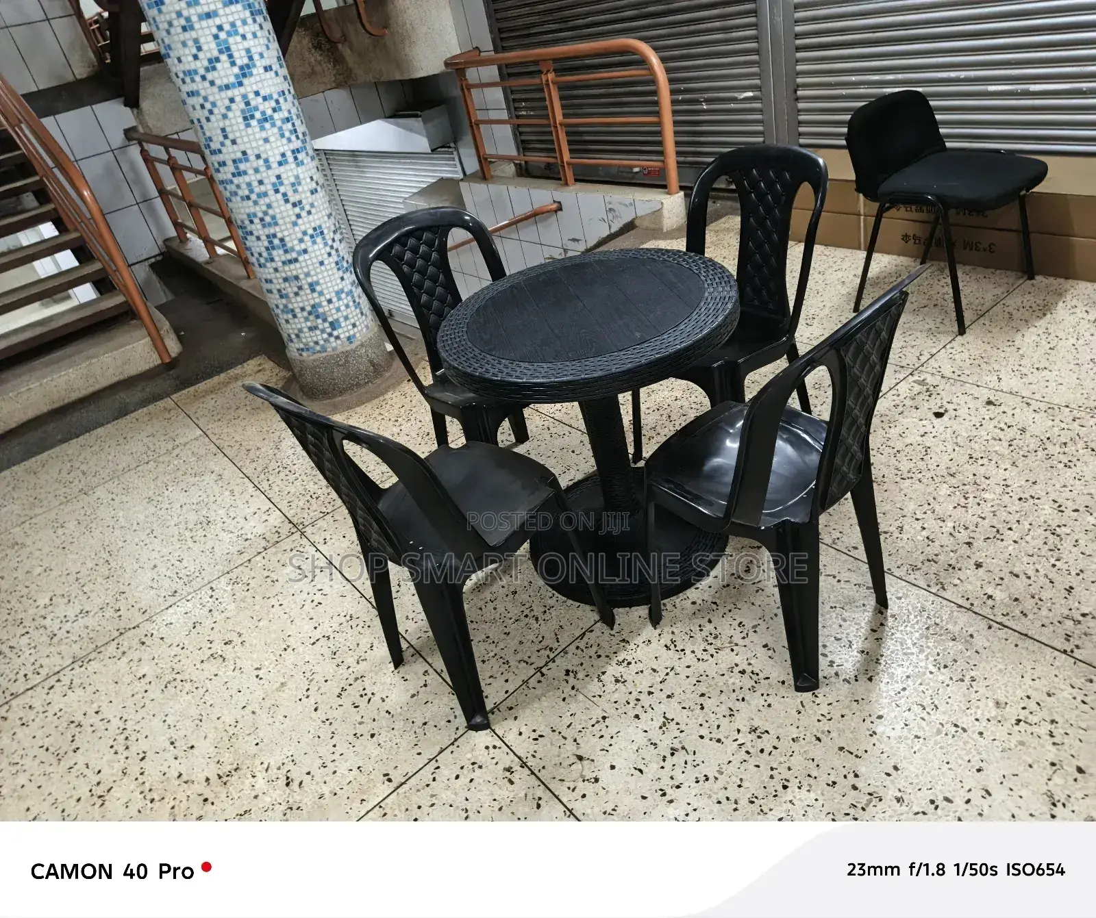 A Set of Plastic Tabe and Chairs