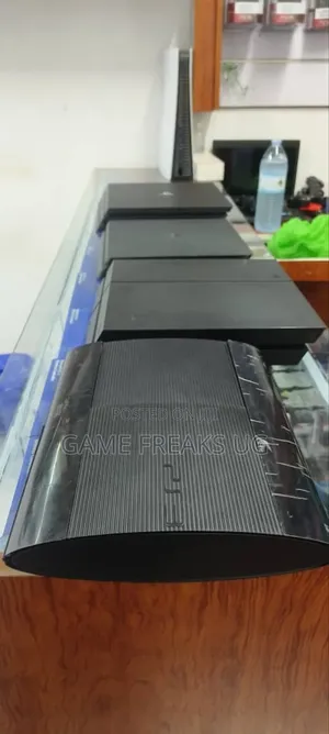 Play Station (3)With 10 Games of Your Choice Controllers