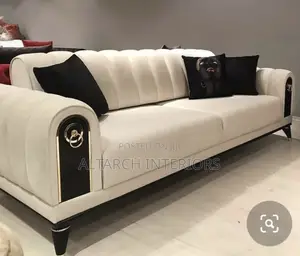White 2 Seater Sofa With Black Qutions and Legs
