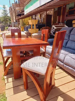 Well Varnished Brown Four Seats Dinning Table