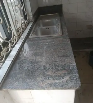 Wavy Grey Granite and Marble