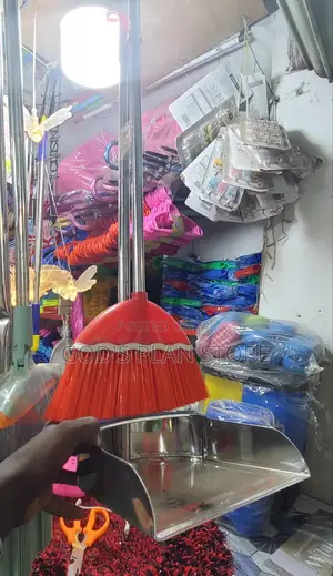 Stainless Steel Dust Pan and a Broom
