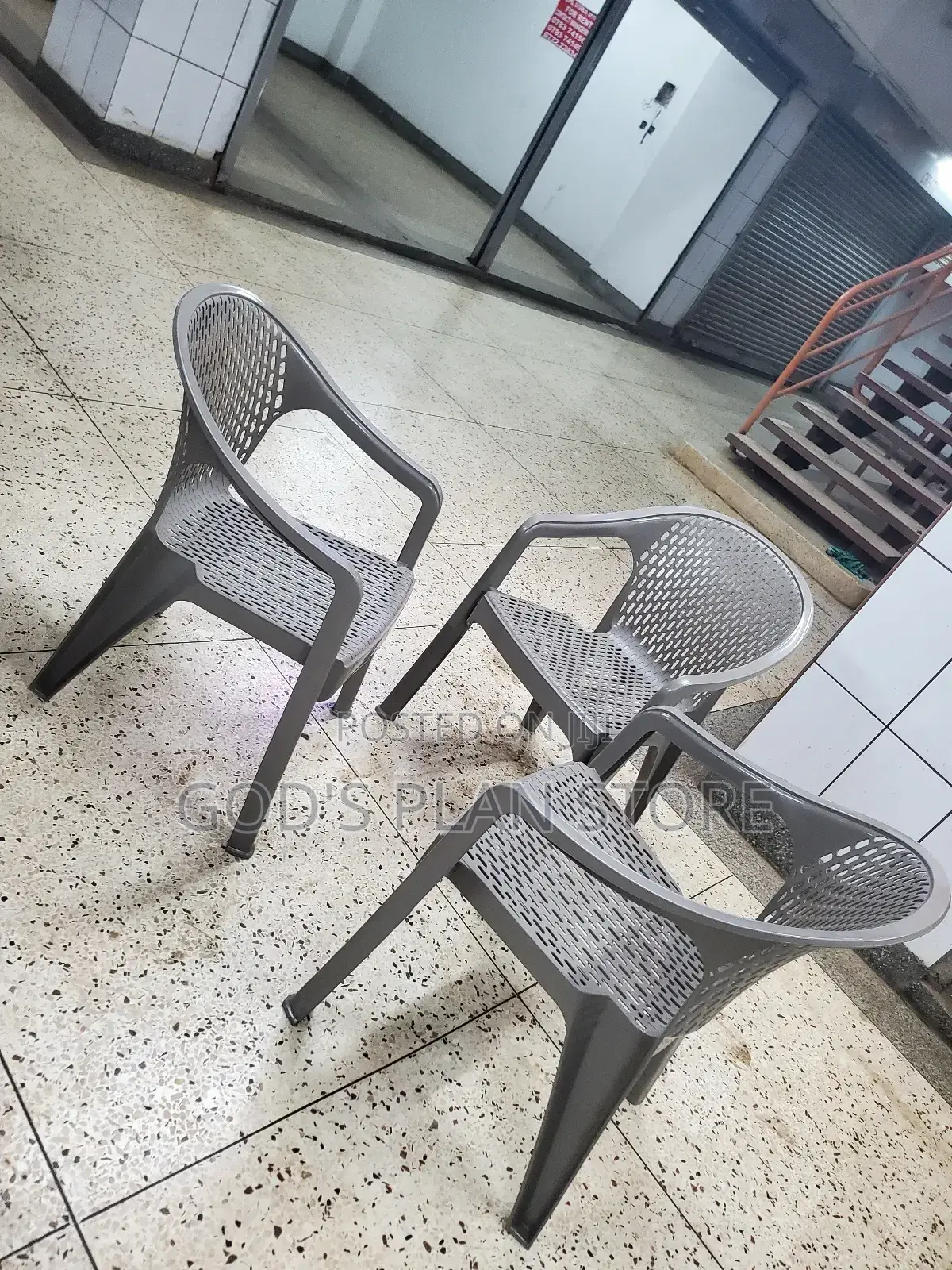 Gray Textured Armed Plastic Chairs Plastic Chairs