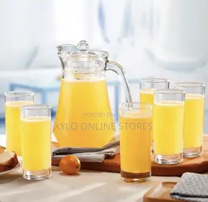 A Set of 6 Unique Ceramic Glasses With a Jar