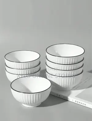 A Set of 6 White Ceramic Soup Bowls With a Black Ring
