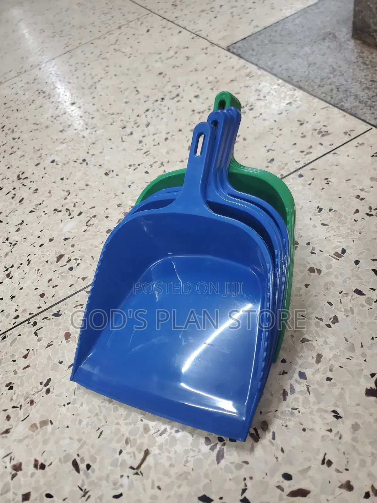 Blue and Green Plastic Dust Pans
